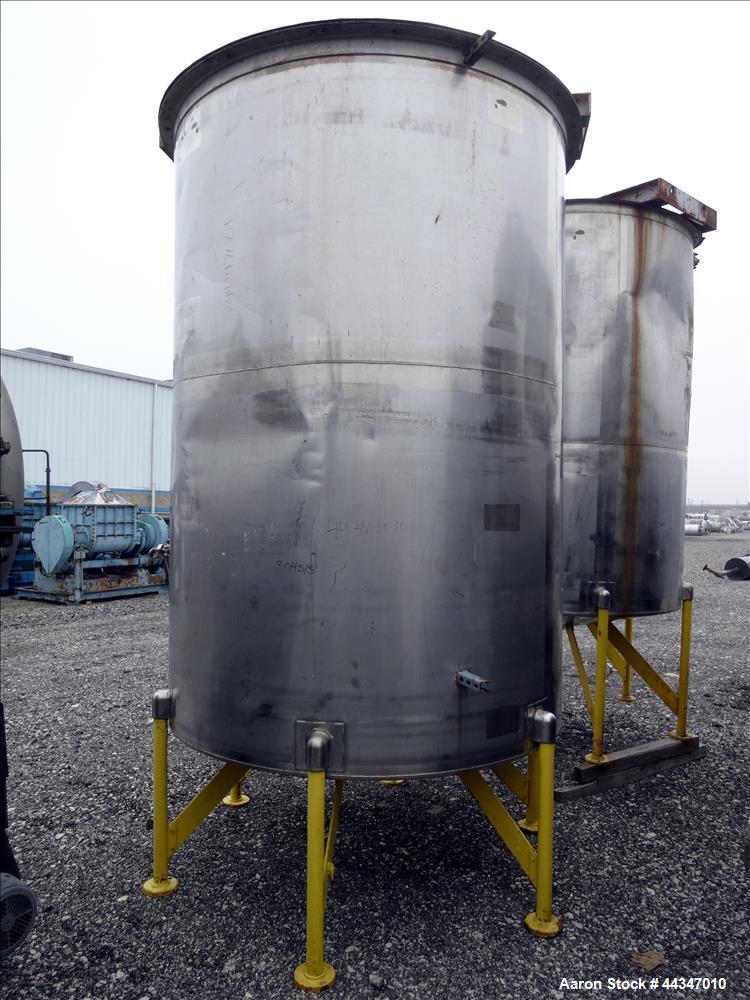 Used United Utensils Tank, 2000 Gallon, 304 Stainless Steel, Vertical. Approximate 72" diameter x 108" straight side. Open top with hinged cover, coned bottom. Approximate 3" center bottom outlet, se...