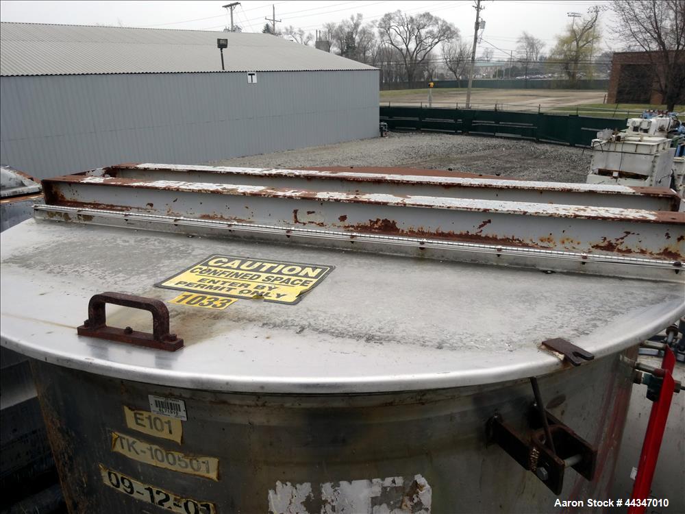 Used United Utensils Tank, 2000 Gallon, 304 Stainless Steel, Vertical. Approximate 72" diameter x 108" straight side. Open top with hinged cover, coned bottom. Approximate 3" center bottom outlet, se...