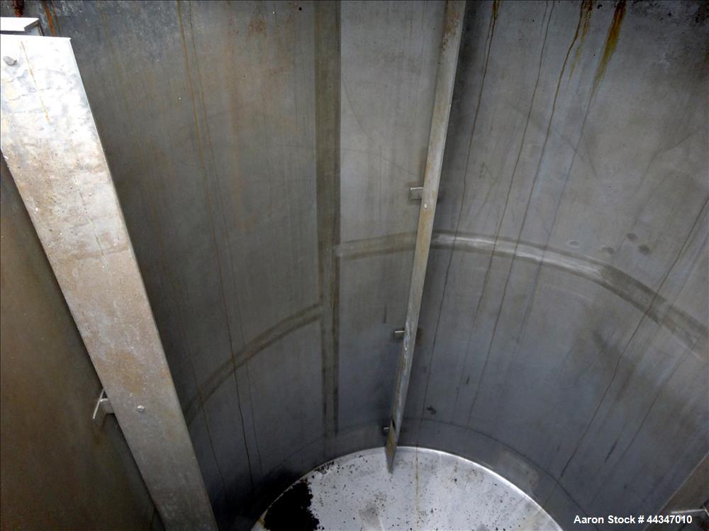 Used United Utensils Tank, 2000 Gallon, 304 Stainless Steel, Vertical. Approximate 72" diameter x 108" straight side. Open top with hinged cover, coned bottom. Approximate 3" center bottom outlet, se...