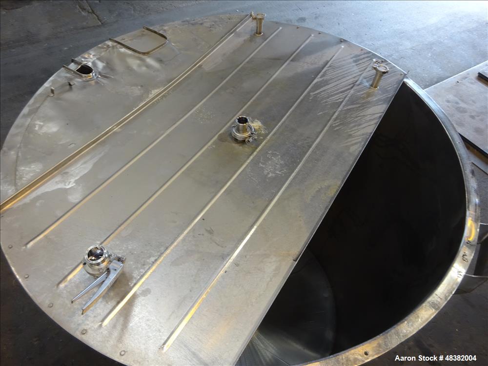Used Perma-San Tank, 2,000 Gallon, 316 Stainless Steel, Vertical. Approximate 82" diameter x 91" straight side, flat top, slopped bottom. (2) 1/3 Hinged covers. Spray ball. Provision for side enterin...