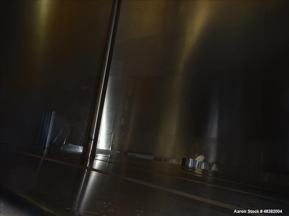 Used Perma-San Tank, 2,000 Gallon, 316 Stainless Steel, Vertical. Approximate 82" diameter x 91" straight side, flat top, slopped bottom. (2) 1/3 Hinged covers. Spray ball. Provision for side enterin...