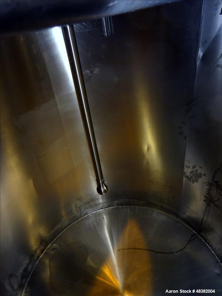 Used Perma-San Tank, 2,000 Gallon, 316 Stainless Steel, Vertical. Approximate 82" diameter x 91" straight side, flat top, slopped bottom. (2) 1/3 Hinged covers. Spray ball. Provision for side enterin...