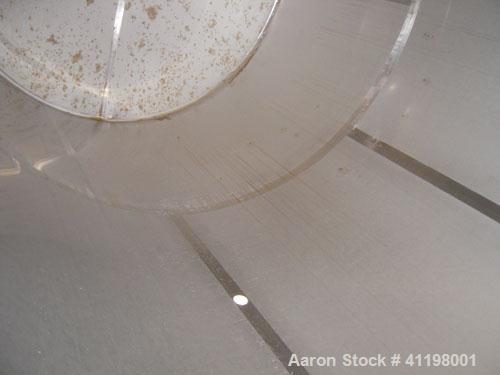 Used W.H.E Bio-Systems Inc. Tank, 4000 Gallon, 304 Stainless Steel, Vertical. 92" diameter x 140" straight side. Slight cone top, coned bottom. Internal spray ball. Side bottom entering Lightnin Agit...