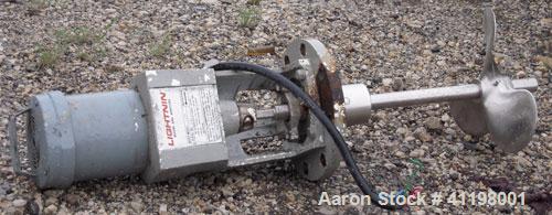 Used W.H.E Bio-Systems Inc. Tank, 4000 Gallon, 304 Stainless Steel, Vertical. 92" diameter x 140" straight side. Slight cone top, coned bottom. Internal spray ball. Side bottom entering Lightnin Agit...