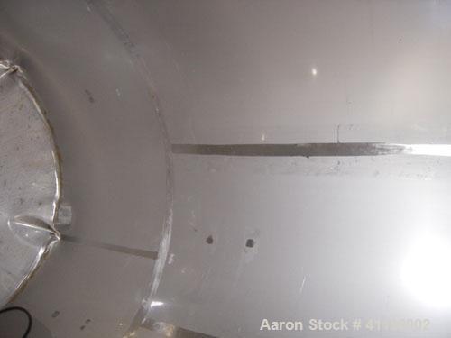 Used W.H.E. Bio-Systems Tank, 4000 Gallon, 304 Stainless Steel, Vertical. 92" diameter x 140" straight side. Slight cone top, coned bottom. Internal spray ball.  Side bottom entering agitator, approx...