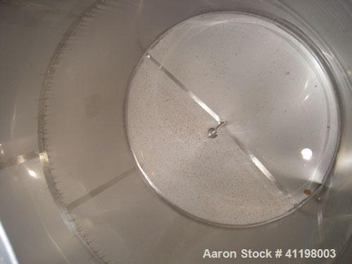 Used W.H.E. Bio-Systems Tank, 4000 Gallon, 304 Stainless Steel, Vertical. 92" diameter x 140" straight side. Slight cone top, coned bottom. Internal spray ball. Side bottom entering agitator, approxi...