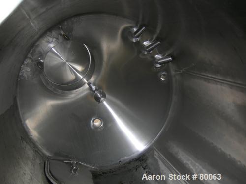 USED: Walker tank, 1000 gallon, 316 stainless steel, vertical. 54" diameter x 99" straight side, dish top and bottom. Openings: top (3) 2-1/2" tri clamp, (2) 2" tri clamp, 3" tri clamp, 19" manway wi...