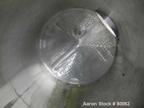 USED: Walker tank, 1000 gallon, 316 stainless steel, vertical. 54" diameter x 99" straight side, dish top and bottom. Openings: top (3) 2-1/2" tri clamp, (2) 2" tri clamp, 3" tri clamp, 19" manway wi...