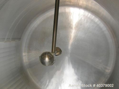 Used Walker Stainless Pressurized Sterilizer Tank, 1000 Gallon, 304 Stainless Steel, Horizontal. Jacketed and insulated. 66" Diameter x 64" straight side, dished heads. 50 Square feet of jacket rated...