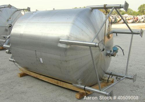 Used Walker Tank, 1000 Gallon, 316 Stainless Steel, Vertical. 66" diameter x 72" straight side, dished top and bottom. Internal rated to 250 deg F. (2) spray balls. Fixed stainless steel agitator bri...