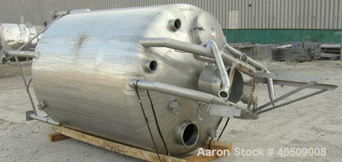 Used Walker Tank, 1000 Gallon, 316 Stainless Steel, Vertical. 66" diameter x 72" straight side, dished top and bottom. Internal rated to 250 deg F. (2) spray balls. Fixed stainless steel agitator bri...