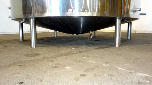Used Walker Stainless Mix Tank, 1500 Gallon, 304 Stainless Steel, Vertical. Approximate 84" diameter x 64" straight side. Dished top, coned bottom. Internal rated atmospheric at 100 degrees F. Top mo...