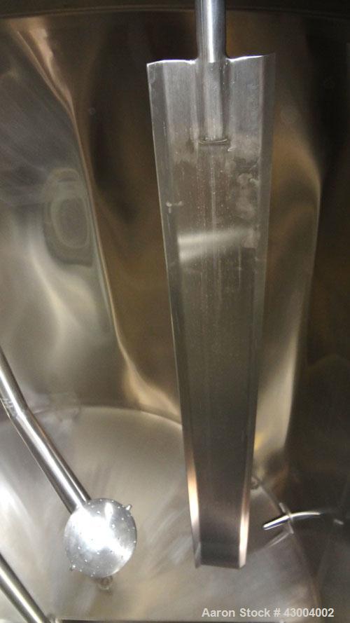 Used Walker Stainless Mix Tank, 1500 Gallon, 304 Stainless Steel, Vertical. Approximate 84" diameter x 64" straight side. Dished top, coned bottom. Internal rated atmospheric at 100 degrees F. Top mo...