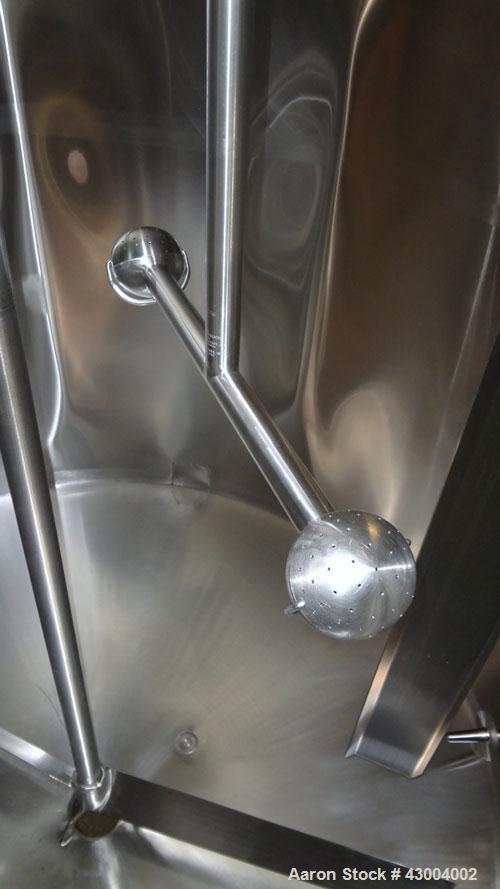 Used Walker Stainless Mix Tank, 1500 Gallon, 304 Stainless Steel, Vertical. Approximate 84" diameter x 64" straight side. Dished top, coned bottom. Internal rated atmospheric at 100 degrees F. Top mo...