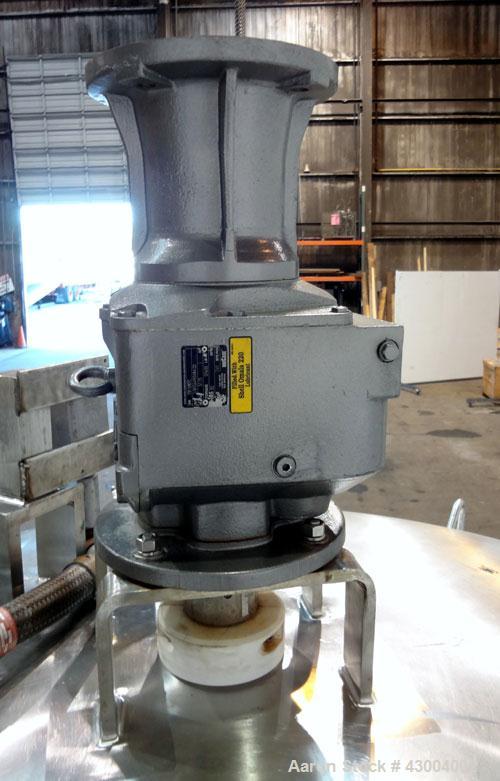 Used Walker Stainless Mix Tank, 1500 Gallon, 304 Stainless Steel, Vertical. Approximate 84" diameter x 64" straight side. Dished top, coned bottom. Internal rated atmospheric at 100 degrees F. Top mo...