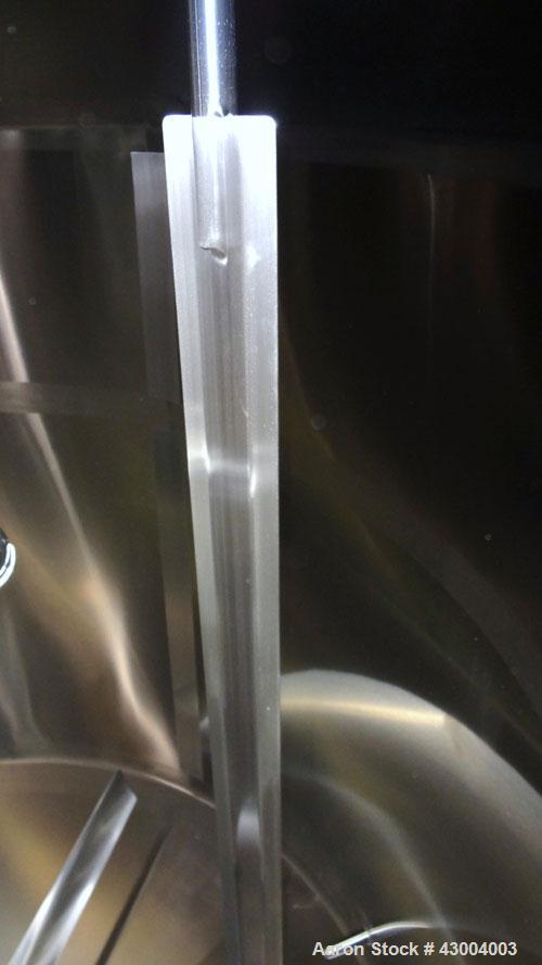 Used Walker Stainless Mix Tank, 1500 Gallon, 304 Stainless Steel, Vertical. Approximate 84” diameter x 64” straight side. Dished top, coned bottom. Internal rated atmospheric at 250 degrees F. Top mo...