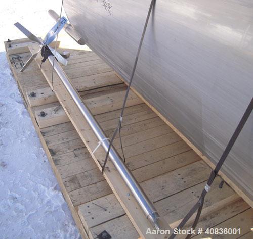 Used Walker Stainless Tank, 1000 Gallon, 316 Stainless Steel, Vertical.  66" diameter x 72" straight side, dished top, coned bottom.  Internal rated atmospheric at 250 deg F.  Off center top entering...