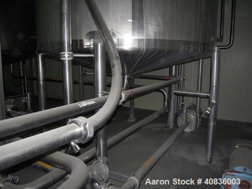 Used Walker Stainless Tank, 1000 gallon, 316 stainless steel, vertical. 66" diameter x 72" straight side, dished top, coned bottom. Off center top entering agitator, 2" diameter bottom supported shaf...