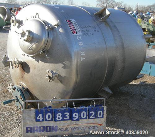 Used Walker Stainless Pressure Tank, 1000 Gallon, 316 stainless steel, vertical. 66" diameter x 72" straight side. Dish top and bottom. Internal rated 25 psi at 100 deg F. Off center top entering Lig...