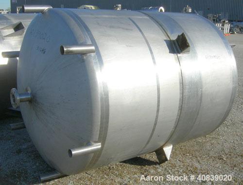 Used Walker Stainless Pressure Tank, 1000 Gallon, 316 stainless steel, vertical. 66" diameter x 72" straight side. Dish top and bottom. Internal rated 25 psi at 100 deg F. Off center top entering Lig...