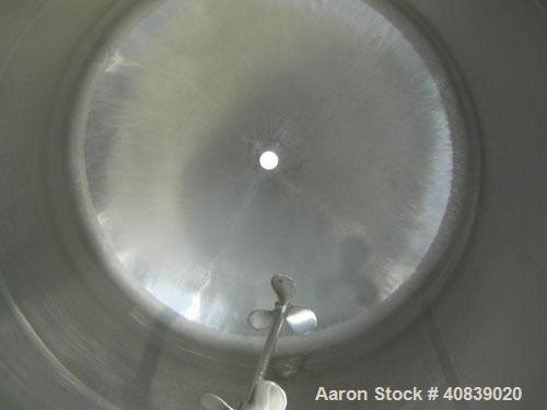 Used Walker Stainless Pressure Tank, 1000 Gallon, 316 stainless steel, vertical. 66" diameter x 72" straight side. Dish top and bottom. Internal rated 25 psi at 100 deg F. Off center top entering Lig...