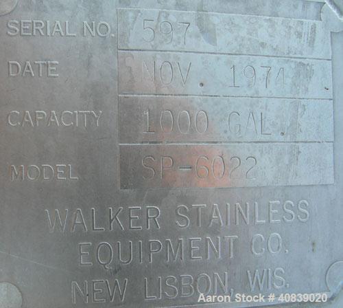 Used Walker Stainless Pressure Tank, 1000 Gallon, 316 stainless steel, vertical. 66" diameter x 72" straight side. Dish top and bottom. Internal rated 25 psi at 100 deg F. Off center top entering Lig...
