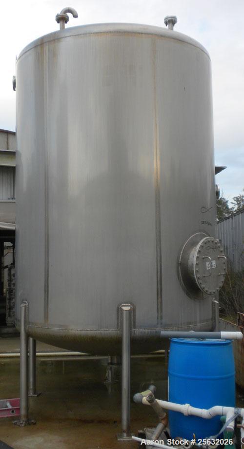 Used Walker Tank, 3,500 Gallon, 304L stainless steel, vertical. Approximate 96" diameter x 120" straight side, dish top and bottom. Misc top and side flanged openings. Side openings include an 18" ma...