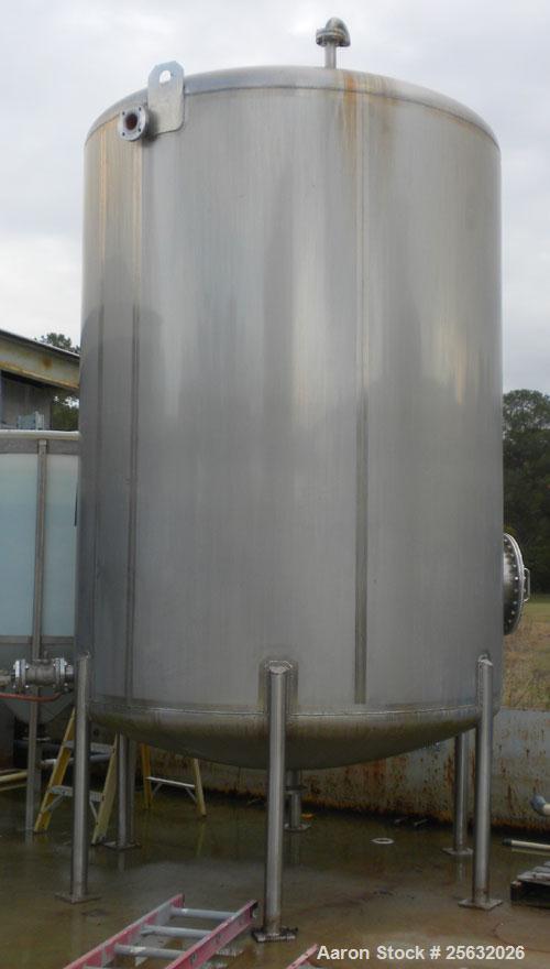Used Walker Tank, 3,500 Gallon, 304L stainless steel, vertical. Approximate 96" diameter x 120" straight side, dish top and bottom. Misc top and side flanged openings. Side openings include an 18" ma...