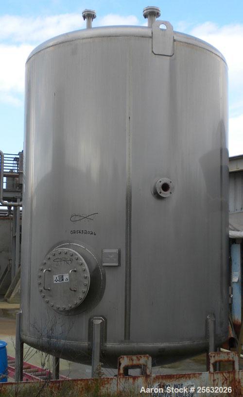 Used Walker Tank, 3,500 Gallon, 304L stainless steel, vertical. Approximate 96" diameter x 120" straight side, dish top and bottom. Misc top and side flanged openings. Side openings include an 18" ma...