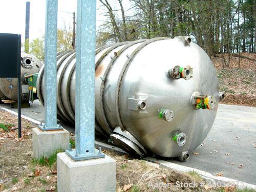 Used: Walker Stainless pressure tank, 3000 gallon, stainless steel, vertical. Approximately 72" diameter x 166" straight side, dished top and bottom. Internal rated 35/fv psi at 325 deg.f.. Foote agi...