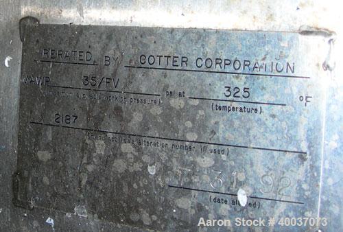 Used: Walker Stainless pressure tank, 3000 gallon, stainless steel, vertical. Approximately 72" diameter x 166" straight side, dished top and bottom. Internal rated 35/fv psi at 325 deg.f.. Foote agi...