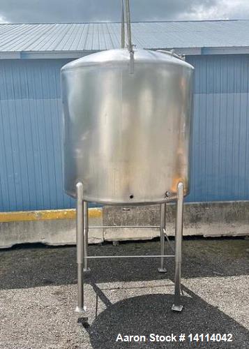 Used- 1850 Gallon Waukesha Cherry Burrell 316 Stainless Steel Tank. Interior Dimensions: 80" x 74" straight side. Center dis...
