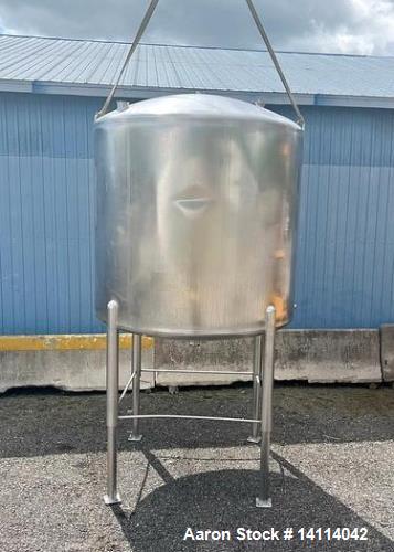 Used- 1850 Gallon Waukesha Cherry Burrell 316 Stainless Steel Tank. Interior Dimensions: 80" x 74" straight side. Center dis...