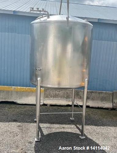 Used- 1850 Gallon Waukesha Cherry Burrell 316 Stainless Steel Tank. Interior Dimensions: 80" x 74" straight side. Center dis...