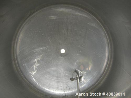 Used Will-Flow Pressure Tank, 1000 Gallon, 316 Stainless Steel, Vertical. 66" diameter x 72" straight side. Dish top and bottom. Internal rated 25 psi at 100 deg F. Off center top entering Lightnin a...