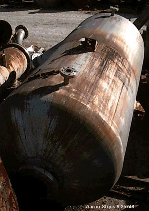 Used Wyatt Pressure Tank, 1590 Gallon, 304L Stainless Steel, Vertical. 60" diameter x 123" straight side, dished top and bottom. Internal rated 400 psi at 212 deg F. Openings: top (3) 4", 1-1/2"; bot...