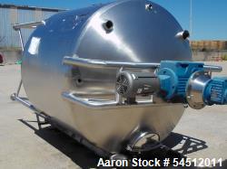 Unused- 2000 Gallon Stainless Steel Tank. Has counter rotating side scrape agitation.