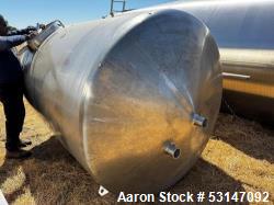 Used 1,500 Gallon Cherry-Burrell Vertical Stainless Steel Tank. Tank measures 5'4" diameter x 7' straight side with dished t...