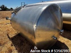 Used Vertical Stainless Steel Tank, Cherry-Burrell 1,500 Gallon. Measures 5'4" diameter x 7' straight side with dished top a...