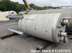 Unused- Crown Iron Works Inc. approximately 1300 gallon 304 stainless steel vertical tank. 60" diameter X 96" high straight ...