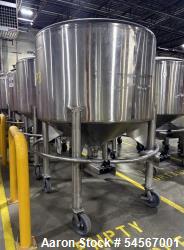Used Tank, Feldmeier 1,000 Gallon, Stainless steel. Dish top, Cone Bottom, On casters with bottom discharge valve.