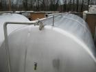 Used-Tank, 1800 Gallons, Stainless Steel, Horizontal.  Sanitary fittings, internal CIP spray ball.  Side manway with cover. ...