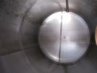 Used-Tank, 1800 Gallons, Stainless Steel, Horizontal.  Sanitary fittings, internal CIP spray ball.  Side manway with cover. ...