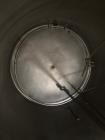 Used-Approximately 1500 Gallon Vertical Stainless Steel Food Grade Mix Tank