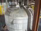 Unused-Used: 2500 gallon stainless steel mixing tank. Dish 144