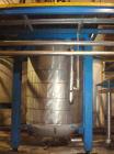 Unused-Used: 2500 gallon stainless steel mixing tank. Dish 144