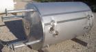 Used Alloy & Steel Fab tank, 1100 gallon, stainless steel, vertical. 68