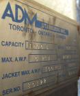 Used Alloy & Steel Fab tank, 1100 gallon, stainless steel, vertical. 68