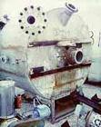 USED: McIver Smith 1000 gal vertical tank. Flat top, dished bottom. The tank includes the following nozzles: top (1) 10