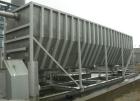 Used: Moon Fabricators 316 stainless steel tank, rectangular, with bottom screw conveyor discharge. Year 2000, serial #B-8025. With 1,000 gallon stainless steel tank.